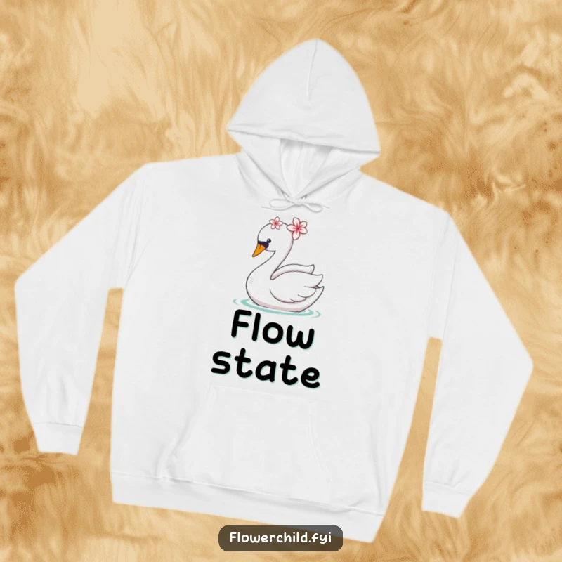 Funny, cozy hoodie showcasing a graceful swan with a flower on its head, gliding peacefully.