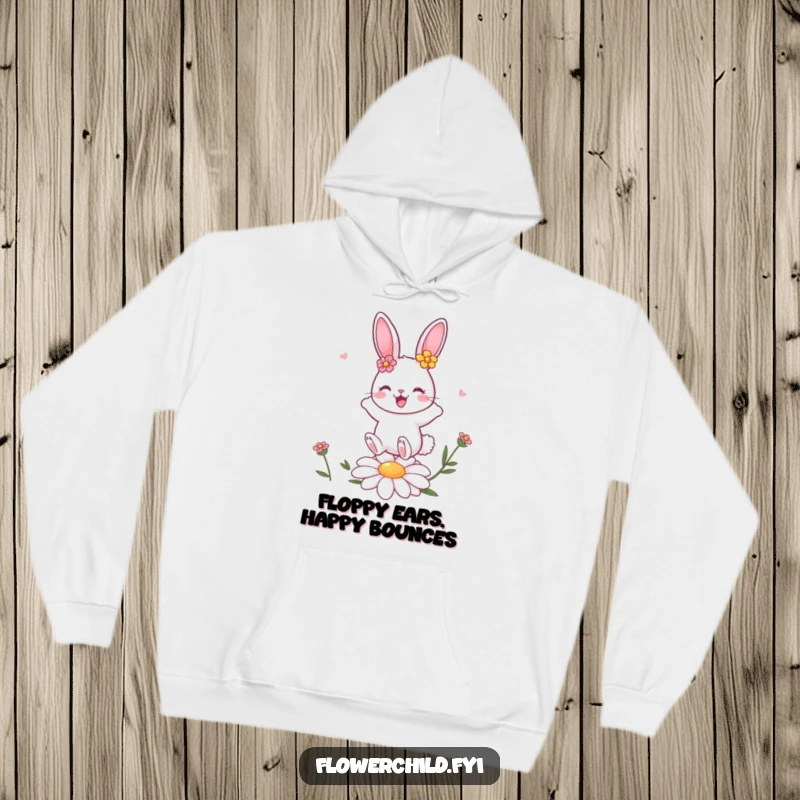 Funny bunny character adorned with flowers gleefully bouncing on a daisy, a warm and cozy hoodie for fans.