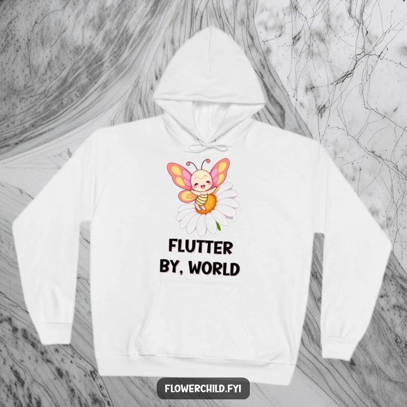 Funny hoodie showcasing a joyful butterfly with vivid, colorful wings dancing happily around a massive, blooming daisy.