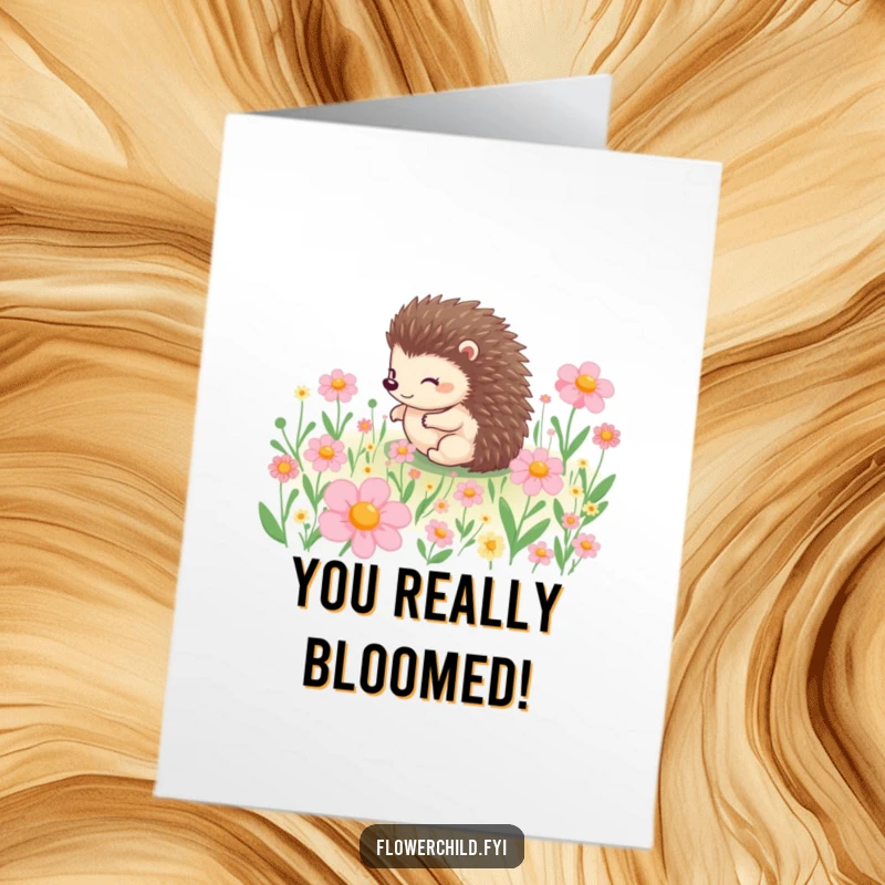 Funny Free Printable Congratulations Card: A happy hedgehog rolling amongst blooming flowers, celebrating good news.