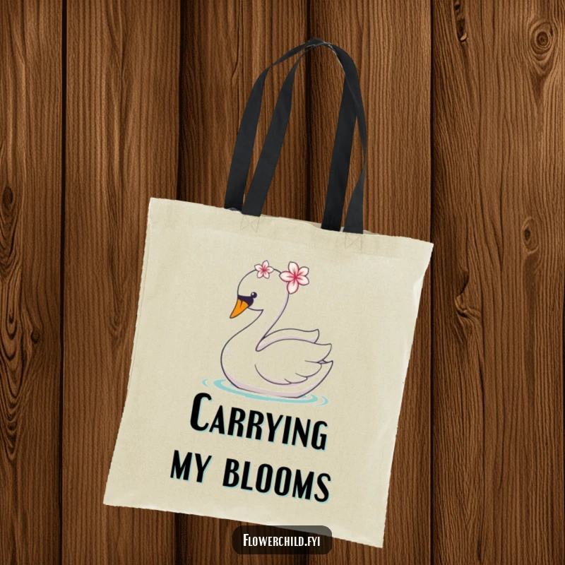 Funny tote bag with a graceful swan adorned with a flower, gliding elegantly, perfect for shopping.